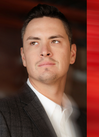 entrepreneur in a truck looking to the side