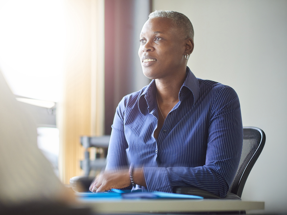 Smiling businesswoman in meeting