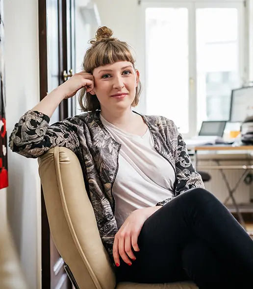 Woman smiling in an office