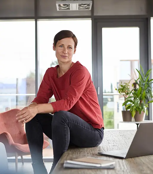 Woman smiling in an office